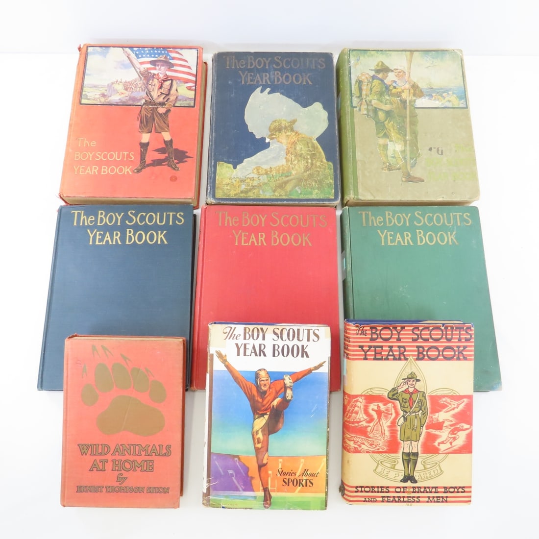 9 1915-1936 Boy Scouts Hardcover Yearbooks: 9 1915-1936 Boy Scouts Hardcover Yearbooks - 1915 1918 1923 1926 1929 1930 1934 1936. Wild Animals at Home 1913. Some Damaged Spines, Some Writing inside Front Pages. LOT SIZE: 15x10x8" 18 LBS All