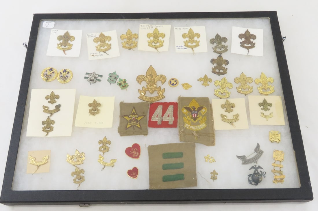 1930s-1950s Boy Scouts Rank Pins & More: 1930s-1950s Boy Scouts Rank Pins & More - In Riker Box. 16x12x1" 2 LBS All information and photos, which are part of the description, are intended to be as accurate as possible, but errors are