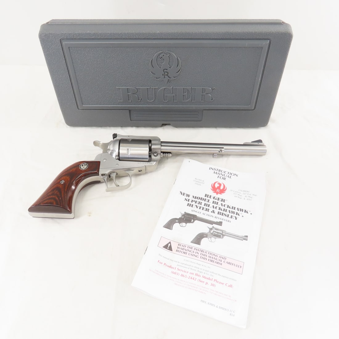 Ruger New Model Super Blackhawk .44 Mag Revolver: Ruger New Model Super Blackhawk .44 Mag Revolver - SN# 87-89798, mfg 1999, satin stainless, 7 1/2" barrel, front ramp and rear notch sights, 6 shot, rosewood grips with eagle medallions, with booklet