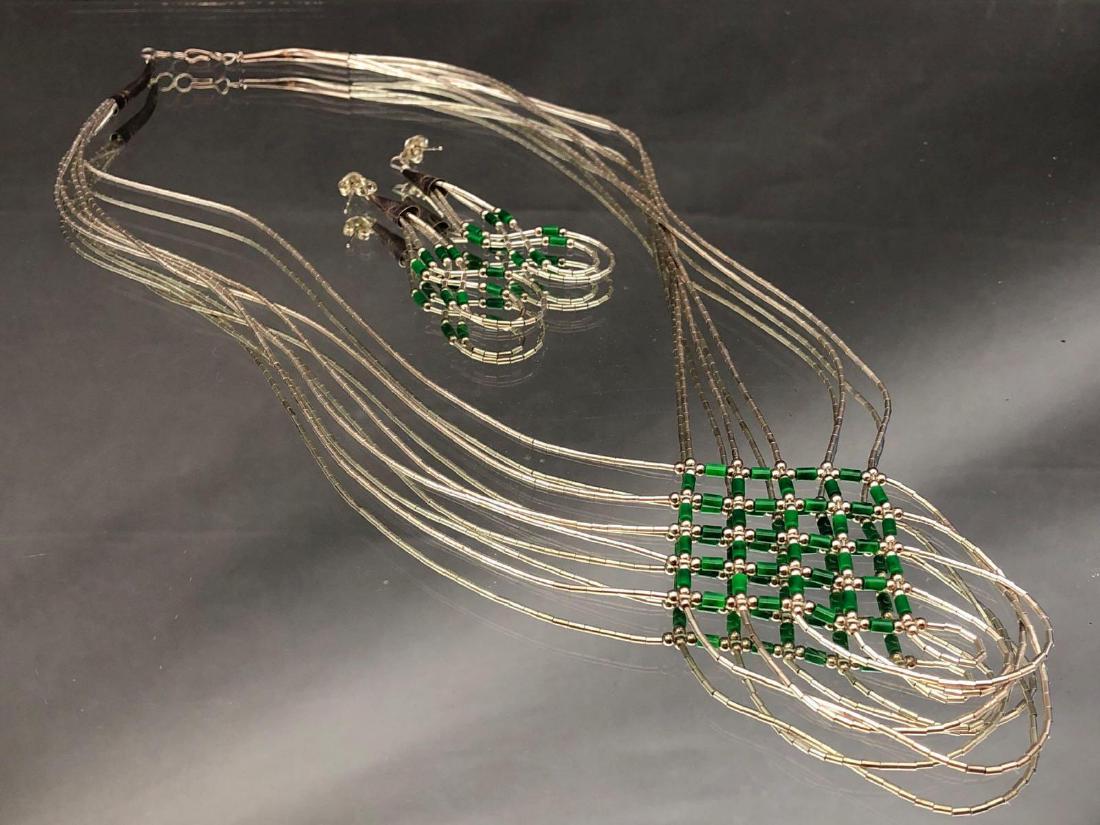 Sterling silver Malachite waterfall necklace and: Sterling silver Malachite waterfall necklace and earrings set. 16.7 g. All credit card purchases will be manually verified prior to shipment.