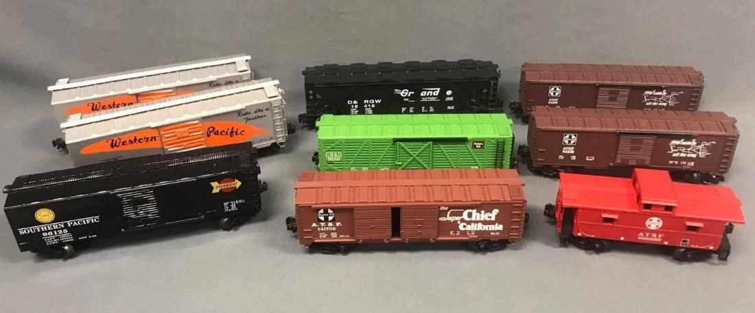 Lot of 9 K-line O scale Freight cars plus Caboose: Lot of 9 K-line O scale Freight cars plus Caboose. Included are Southern Pacific boxcar, 2 Western Pacific Boxcars, 3 ATSF boxcars, D&RGW Hopper, CB&Q boxcar as well as an Atlas ATSF Caboose.