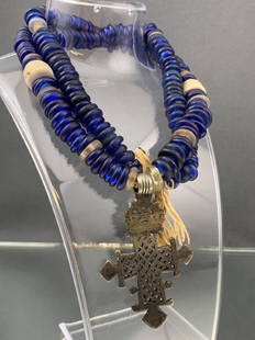 19th C. Ethiopian Trade Bead Necklace with Silver: 19th century Dutch cobalt blue Ethiopian trade bead and silver Coptic cross pendant.