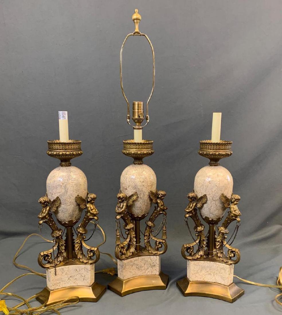 Three gold cherub decorative lamps (1 of 5)