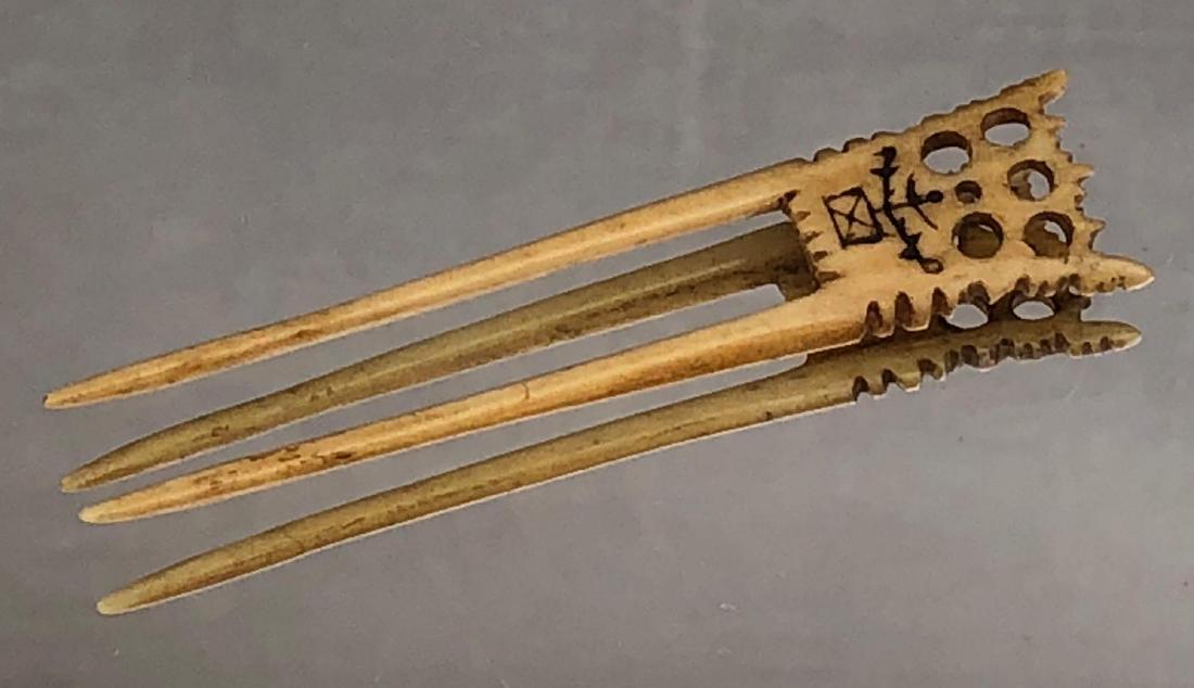 Inuit Eskimo Carved Bone Hair Pin: Inuit Eskimo two prong hair pin artifact with carving thought to symbolise the sunrise, from original collection. Approximately 3 x .75 in