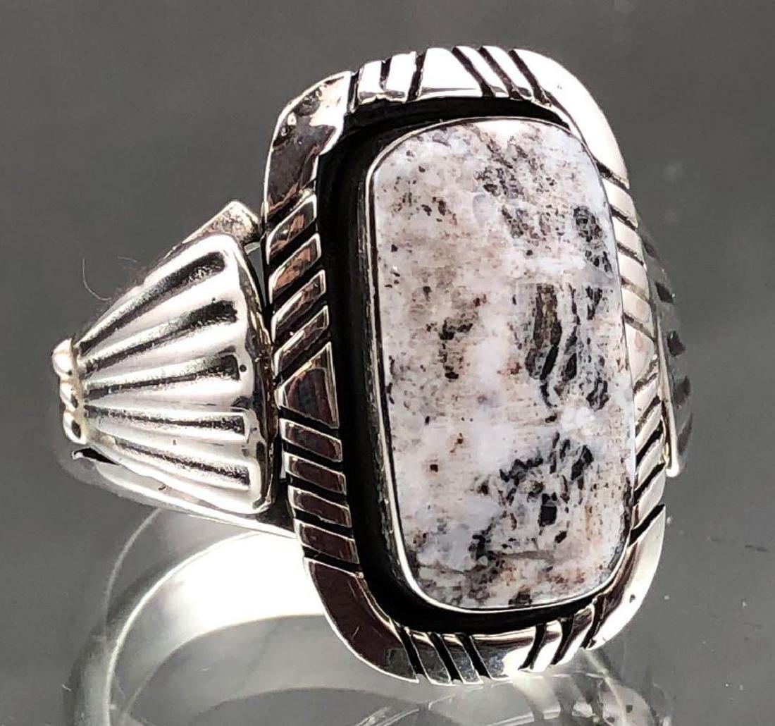 Aaron Begay, Navajo White Buffalo Sterling Ring: Navajo silver and white buffalo turquoise men's ring by Silversmith Aaron Begay, 17.7g. Approximately 1.15 x 1.15 x 1.15 in, size 14. ALL CREDIT CARDS WILL BE MANUALLY VERIFIED PRIOR TO SHIPMENT.