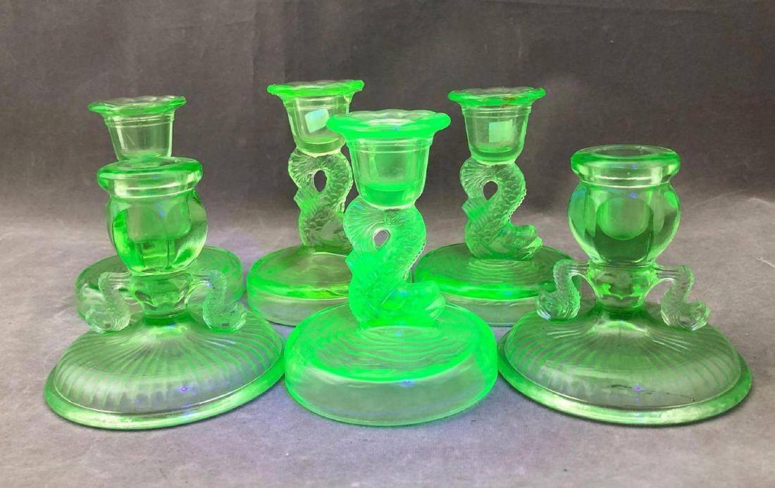 Three Pair of Vaseline Glass Koi Fish Candlesticks: Three pair of Vaseline/uranium glass Chinese Koi fish candlesticks. Approximately 4.5 x 3.5, 3.5 x 4.