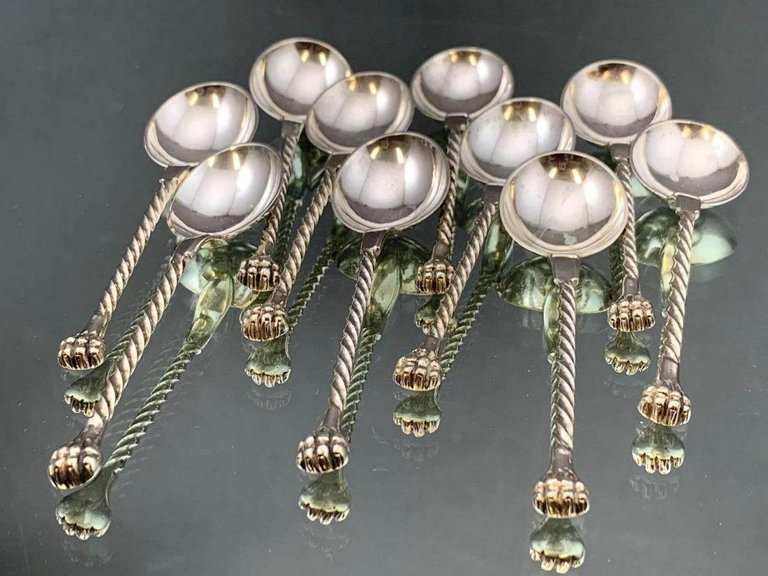 10 Matching Sterling Twist Tea Spoons: Set of 10 Matching Sterling Silver Spoons, rope-like handle design, circular scoop, marked "LC8", 135.7g, approximately 1 x 4 inches. All credit cards will be manually verified prior to shipment.