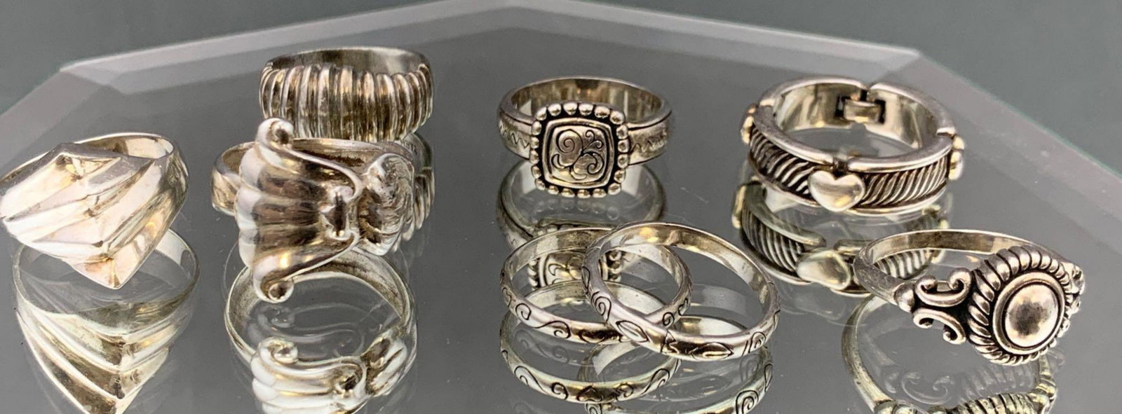 Eight Sterling Silver Rings: Eight sterling silver rings 39.7. Five size 7 rings, two size 9 and 1 size 8 ring. All marked 925. All credit card purchases will be manually verified before shipment.