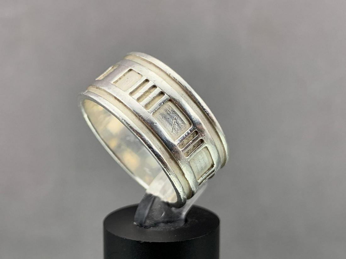 Tiffany And Co. Sterling Silver Ring: Sterling silver ring, 11.1g., size 13, hallmarked Tiffany and Co. 1995 925.