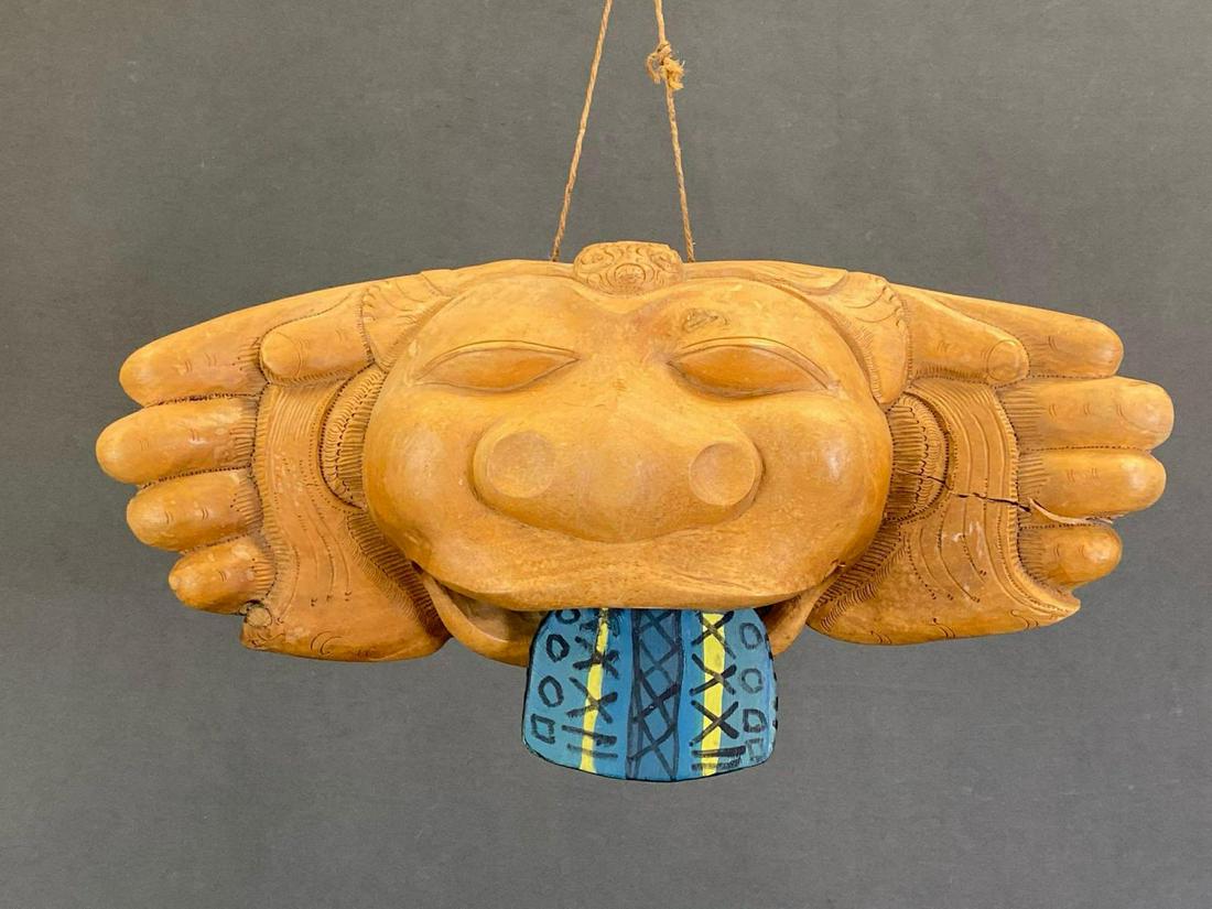 Indonesian Carved Wooden Bell, Possibly an Okokan: Indonesian Carved Wooden Figural Bell, Possibly an Okokan, Hand Painted Detail. Approximately 19.5 x 8 x 6in.