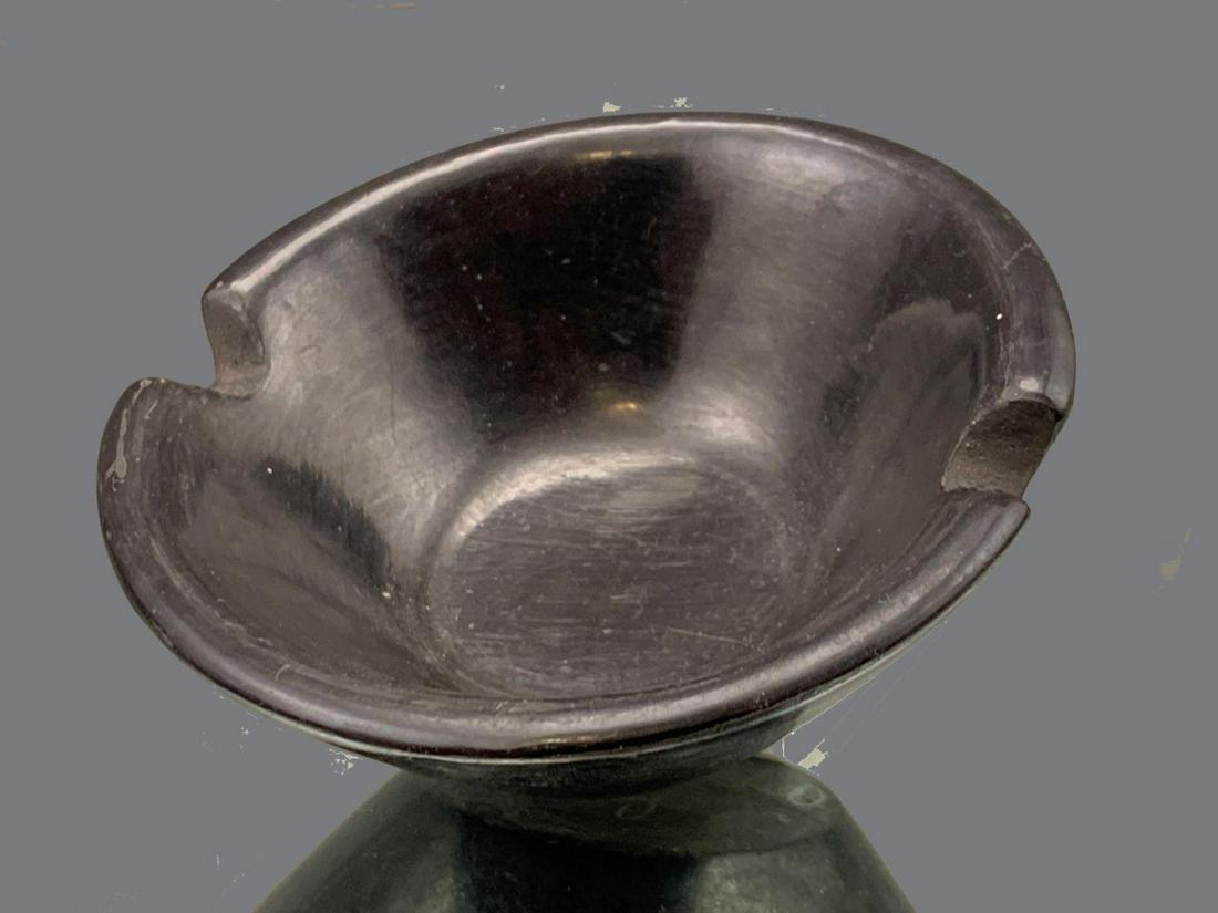 San Ildefonso Pueblo Blackware Pottery by Adam Martinez: San Ildefonso Pueblo Blackware Pottery by Adam Martinez, Signed. Approximately 1.25 x 3.5in diameter.