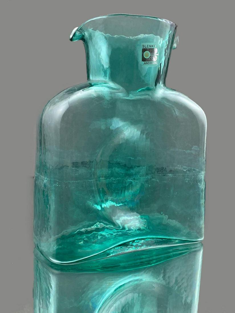 Blenko Antique Green Water Bottle no. 384 1982 By Don: Blenko Antique Green Water Bottle no. 384 1982 By Don Shepherd. Approximately 8 x 6.5 x 3in.
