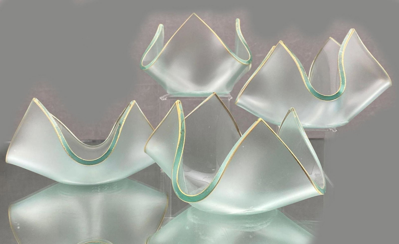 4 Annie Class Glass Anemone Handkerchief Votives With: 4 Annie Class Glass Anemone Handkerchief Votives With Gold Trim. Approximately (2) at 6 x 6 x 3.25in, and (2) at 5.5 x 5.5 x 3.5indiameter.