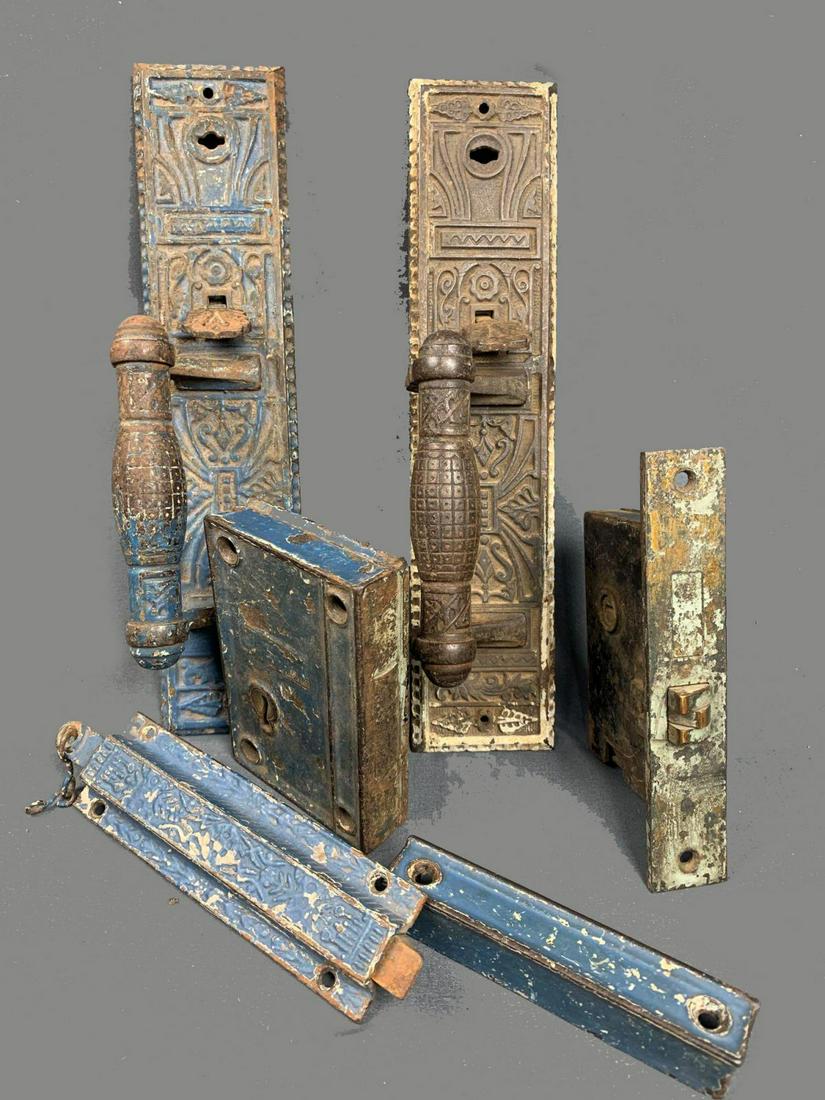 6 Piece Antique Corbin and Eastlake Fancy Iron Door: 6 Piece Antique Corbin and Eastlake Fancy Iron Door Hardware. To include two door plates with handles and levers 12 x 2.75 x 3 in each, one spring loaded pull bolt lock 9 x 2 x 1in, one lock catch kee