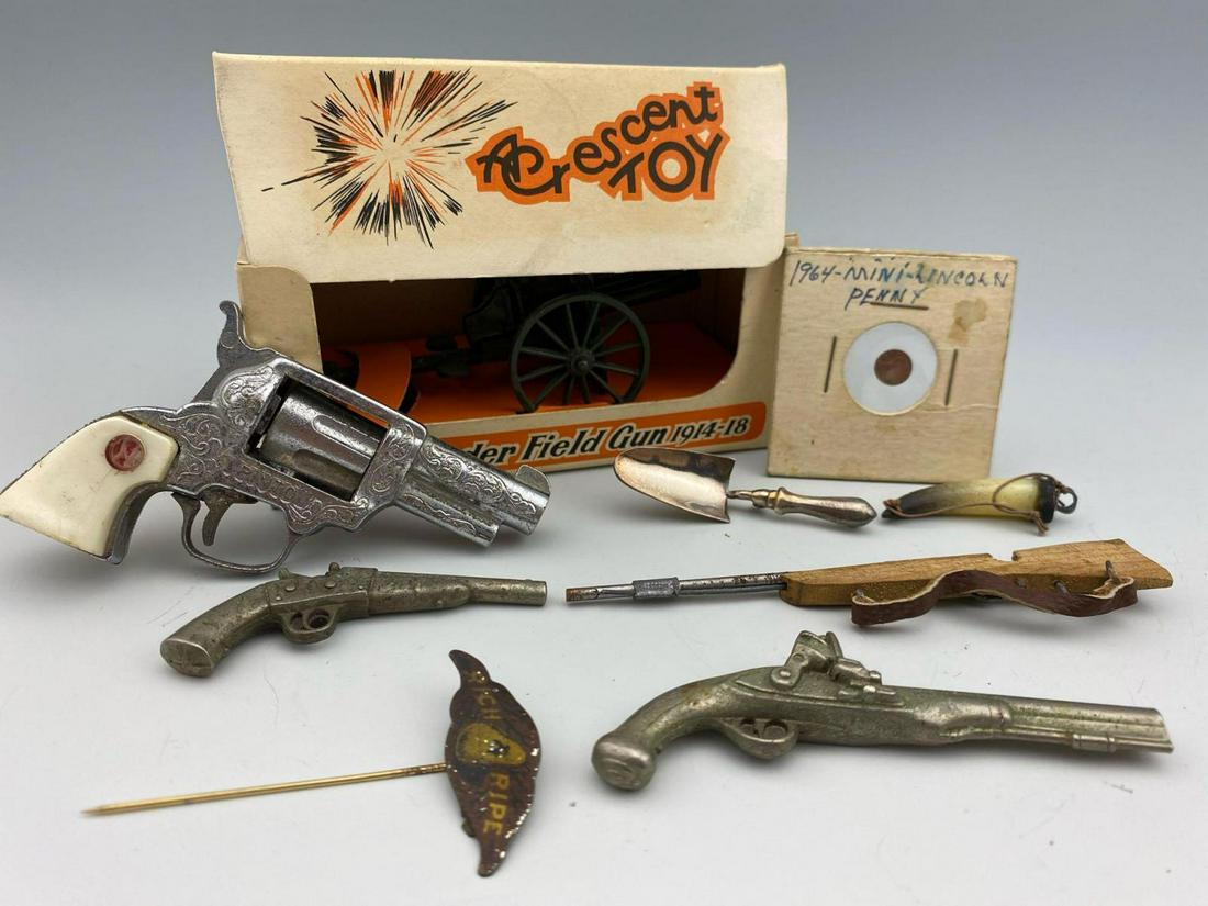 Grouping of Miniature "Man" lot (1 of 7)