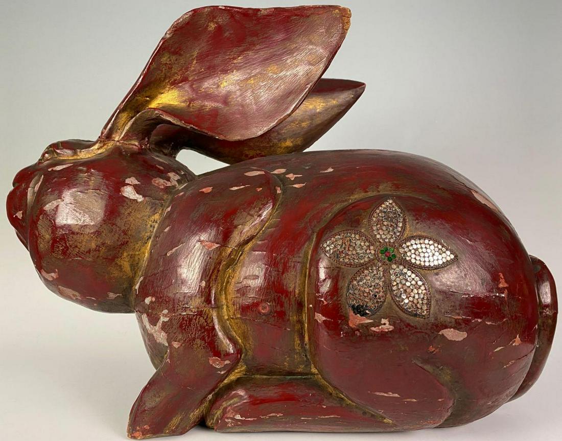 Antique Burmese Gilt and Red Lacquer Carved Rabbit with: Antique Burmese Gilt and Red Lacquer Carved Rabbit with Mirrored Glass Inlay, 18th or 19th Century. Approximately 26.5 x 12.5 x 16.75 In.