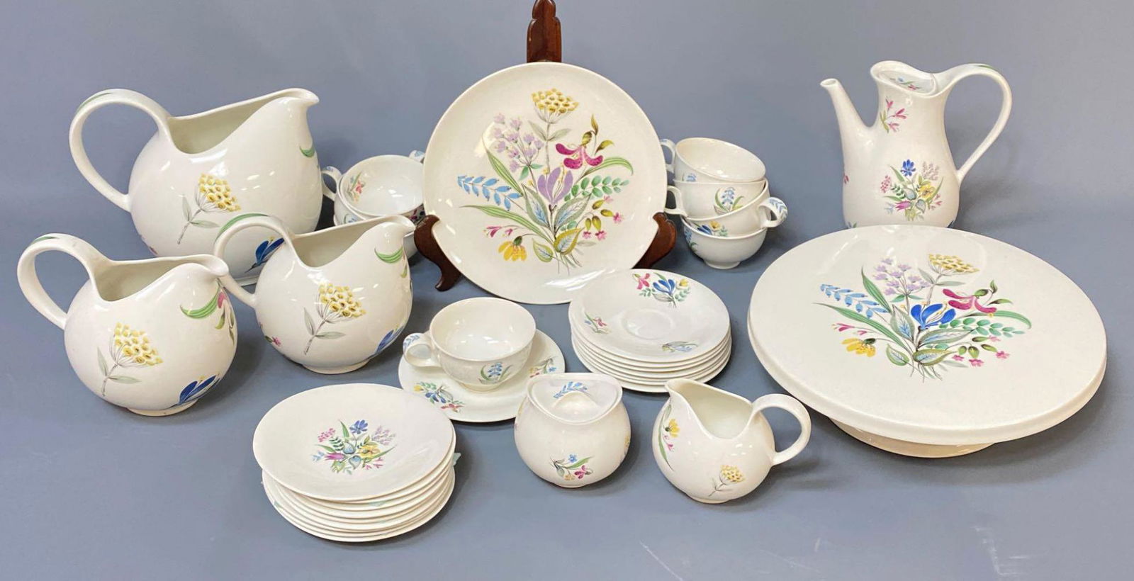35 Piece Eva Zeisel Hallcraft Mid Century Bouquet: 35 Piece Hallcraft Eva Zeisel in Bouquet Floral Pattern Tea Party with 8 Tea Settings and Extras. Collection includes cake platter, 8 mugs, 8 saucers, 9 small plates, 1 round plate, 4 pitchers, Cream