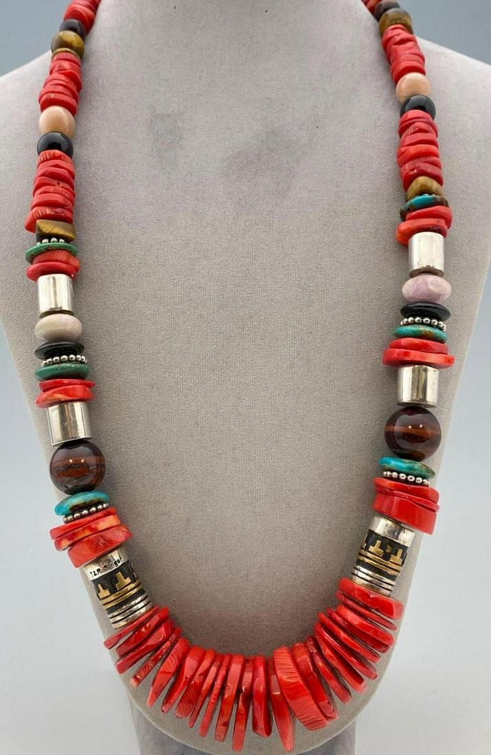 Navajo, Coral, Turquoise, Marble, Onyx, Dyed Jasper,: Navajo, Coral, Turquoise, Marble, Onyx, Dyed Jasper, Sterling Necklace by Rosita Singer, marked T & R Singer, cones marked Sterling, length 28 inches, width 1 inch, measurements are approximate. ALL C