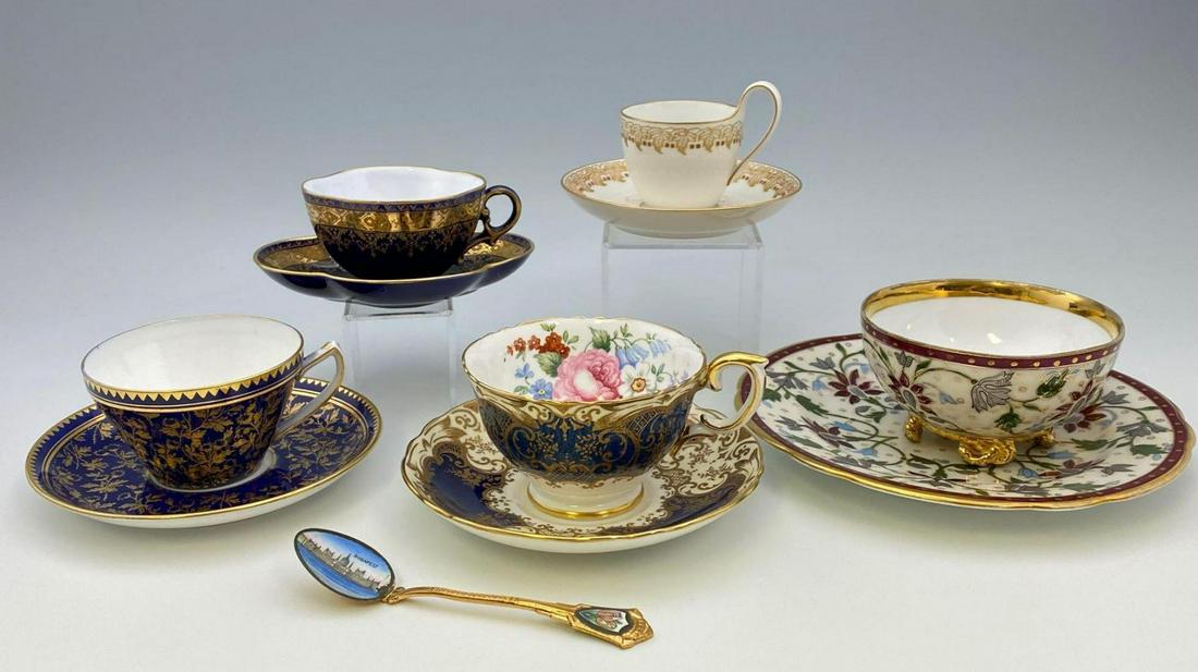 Lot of Porcelain Tea Cups and Saucers: 11 Piece Collection of Tea Cups, Saucers, and a Spoon, includes Fine Bone China, Wedgwood China, KPM China, spoon from Budapest, smallest cup & saucer set approximately 4.5625 x 2.75 inches, largest c