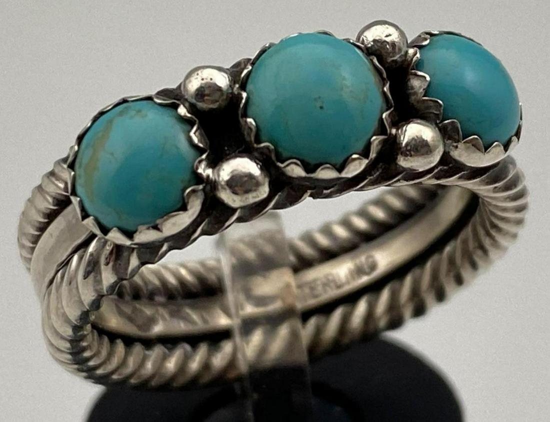 Navajo Sterling Band with 3 Bezel Set Turquoise Stones: Navajo Sterling Band with 3 Bezel Set Turquoise Stones, by Ray King, 9.1g, marked Sterling, signed, ring size 9.5, band width approximately 0.25 inches. ALL CREDIT CARDS WILL BE MANUALLY VERIFIED PRIO