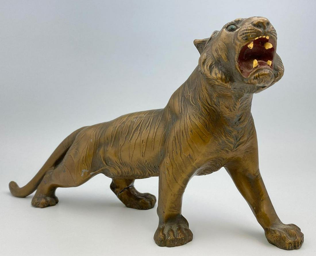 Antique Japanese Bronze Patinated Cast Iron Tiger: Antique Japanese Bronze Patinated Cast Iron Tiger Sculpture, Meiji Period, approximately 11.75 x 3.5 x 6.125 inches