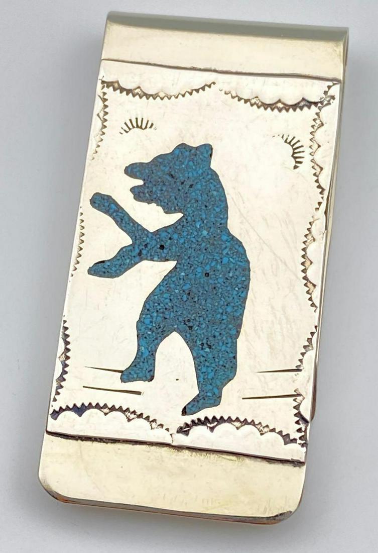 Navajo Sterling Turquoise Bear Money Clip: Navajo Sterling Turquoise Bear Money Clip, with Detailed Stampwork, 19.6g, initialed RB, marked Sterling, approximately 2 x 1 inches. ALL CREDIT CARDS WILL BE MANUALLY VERIFIED PRIOR TO SHIPMENT.