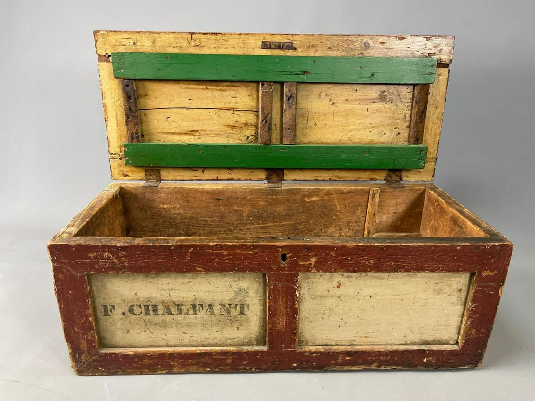 Antique Painted Wooden Traveling Trunk: Painted Wooden Trunk With Hinged Lid and Handles. Approximately 33.75 in x 14.75 in x 12.75 in.