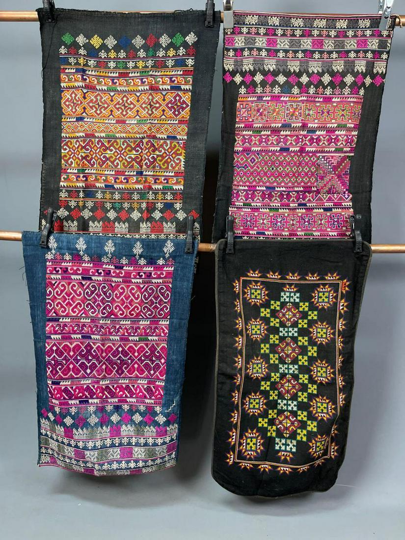 6 Mesoamerican Textiles: 6 Embroidered Colorful Textiles. Colors include pink, orange, green, red, and white. Sizes range from 31.25 in x 20.25 in - 44 in x 37.5 in. Measurements are approximate.