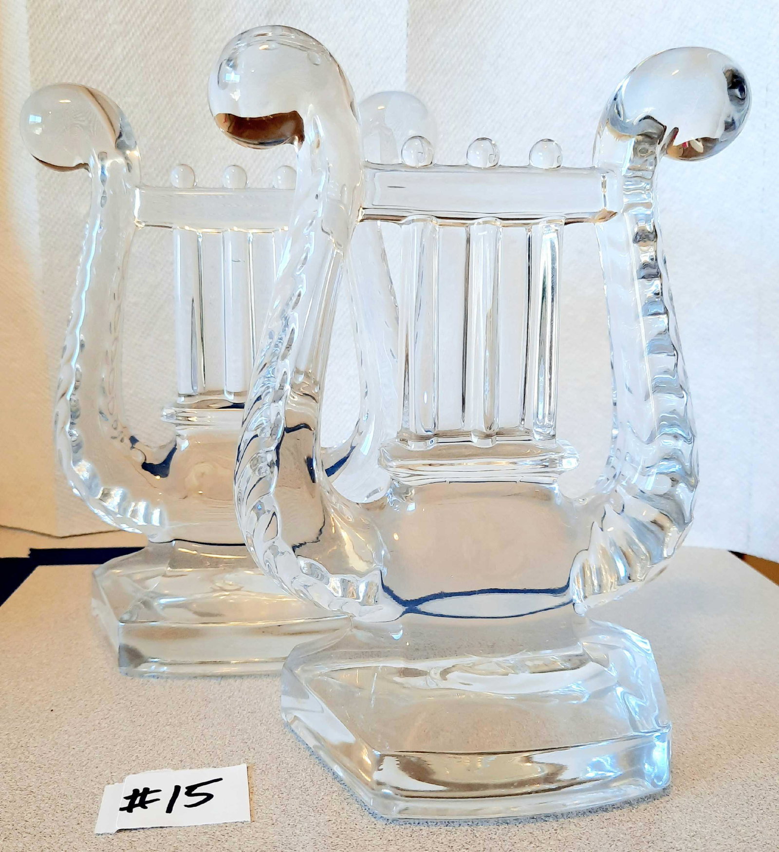 20th Century Glass Harp or Lyre Bookends: 20th Century Glass Harp or Lyre Bookends, attributing to Fostoria. 5.5 in w x 3 in d x 7.5 h. Measurements are approximate. Shipping Available