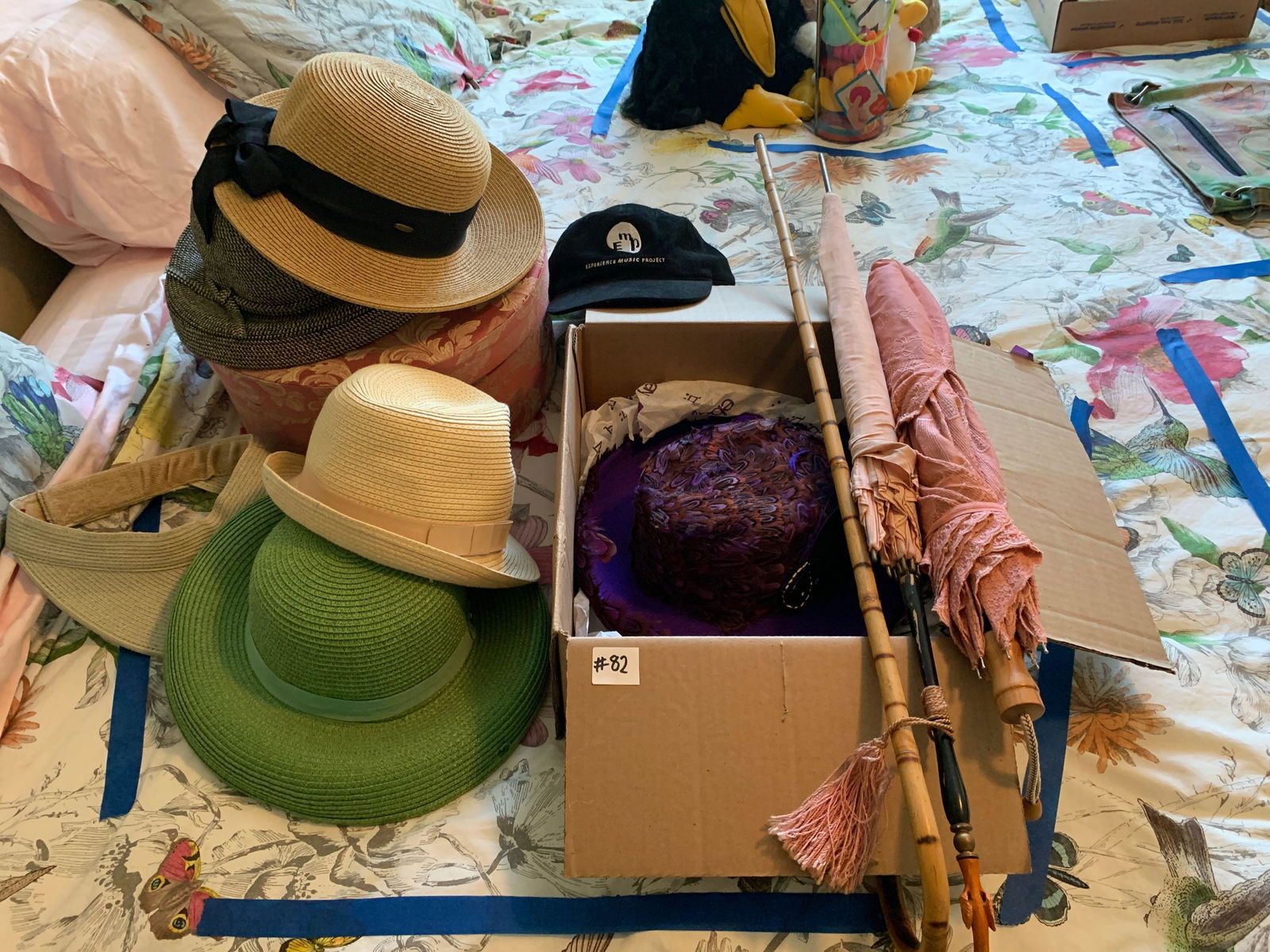 Miscellaneous ladies hats, hat box, feathered hat, and (1 of 4)