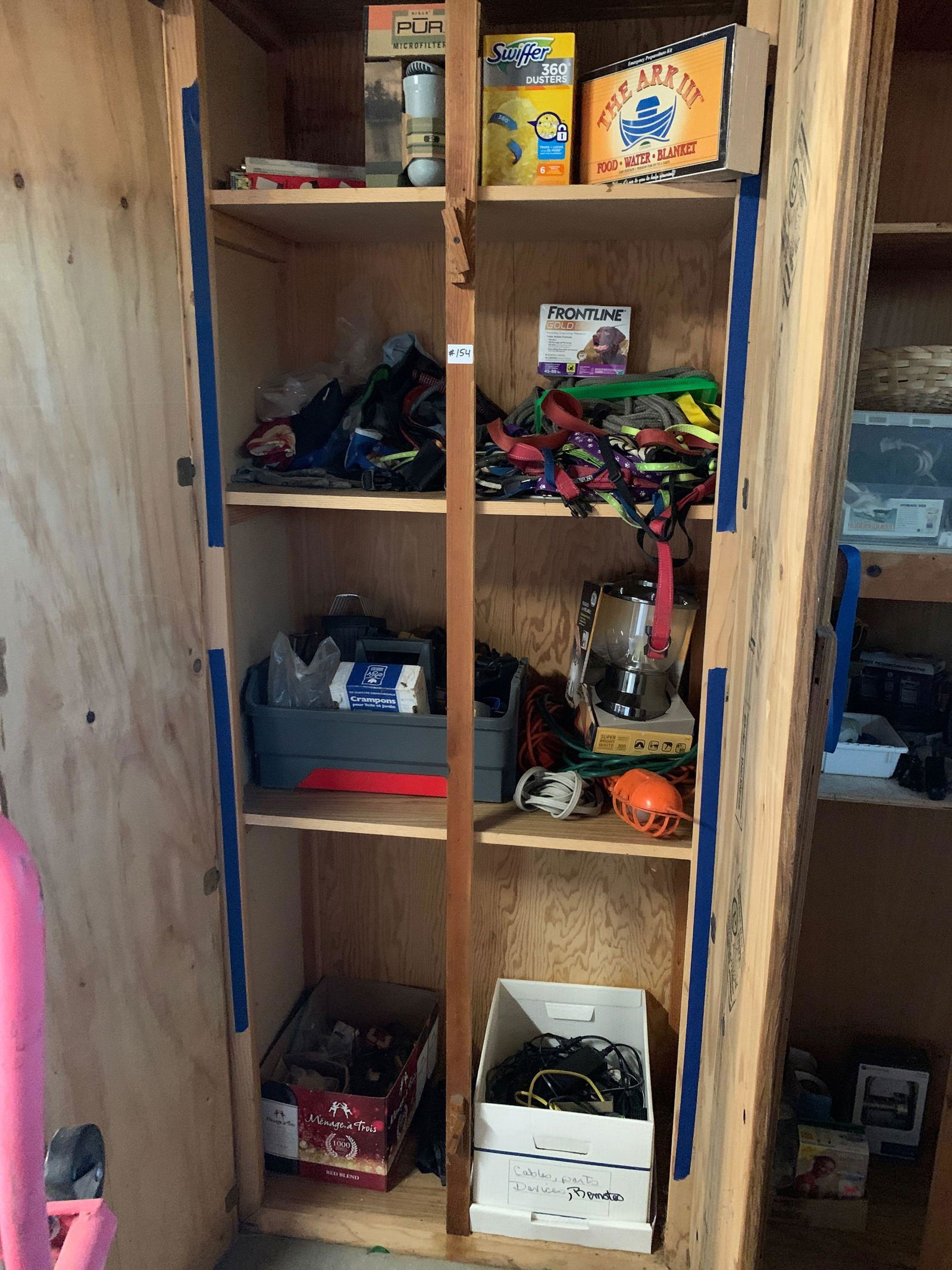 Cupboard chock full of tools, lights, miscellaneous (1 of 6)