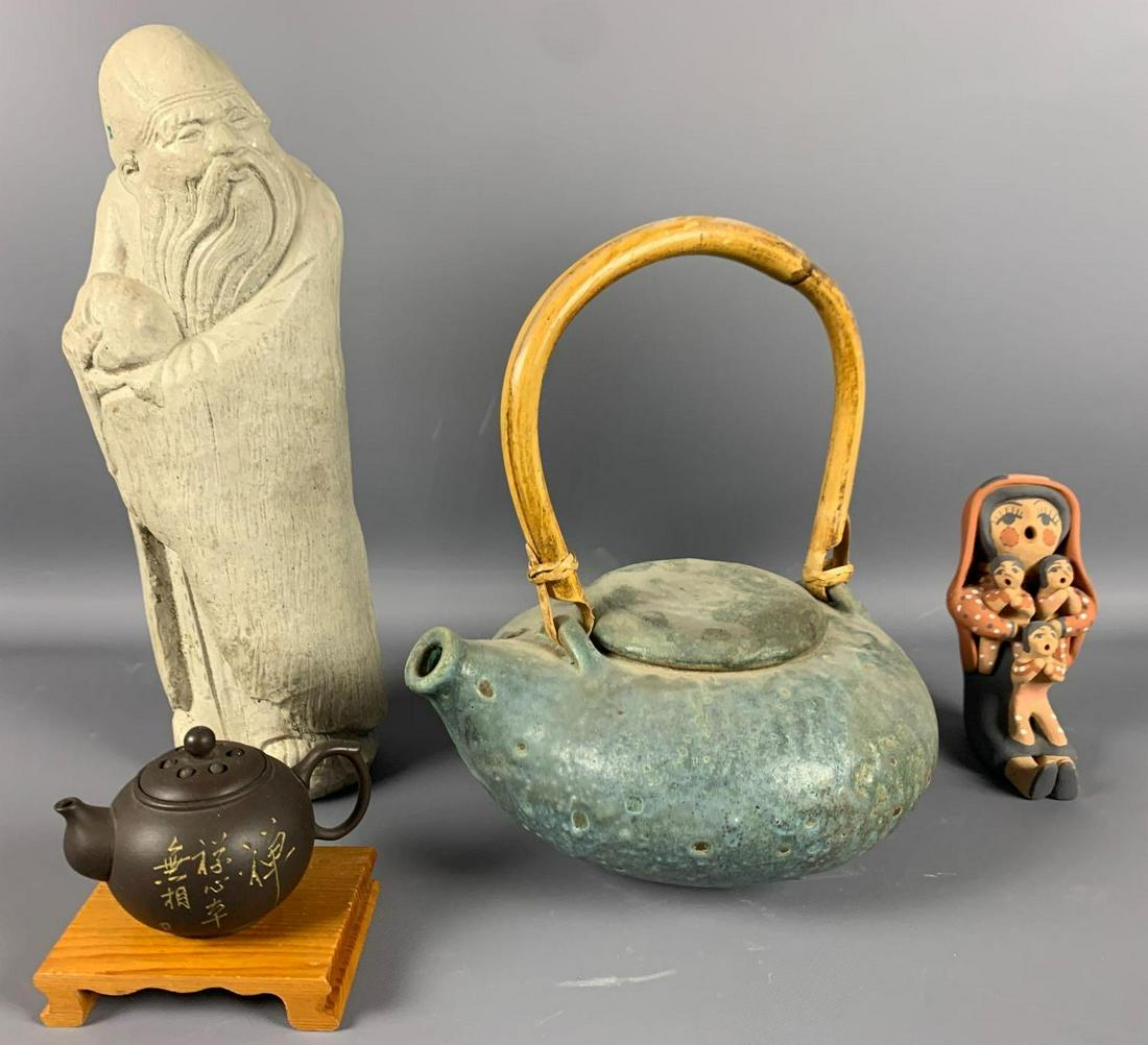 Two tea pots, one statue, one clay figuring (1 of 20)