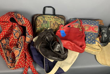 Large vera Bradley duffel bag filled with purses: Large Vera Bradley duffel bag filled with purses; including a black Coach and Red Michael Kors Vera Bradley big duffel bag, zips across top: approximately 23 x 15 x 11, handles are 27 inches long from