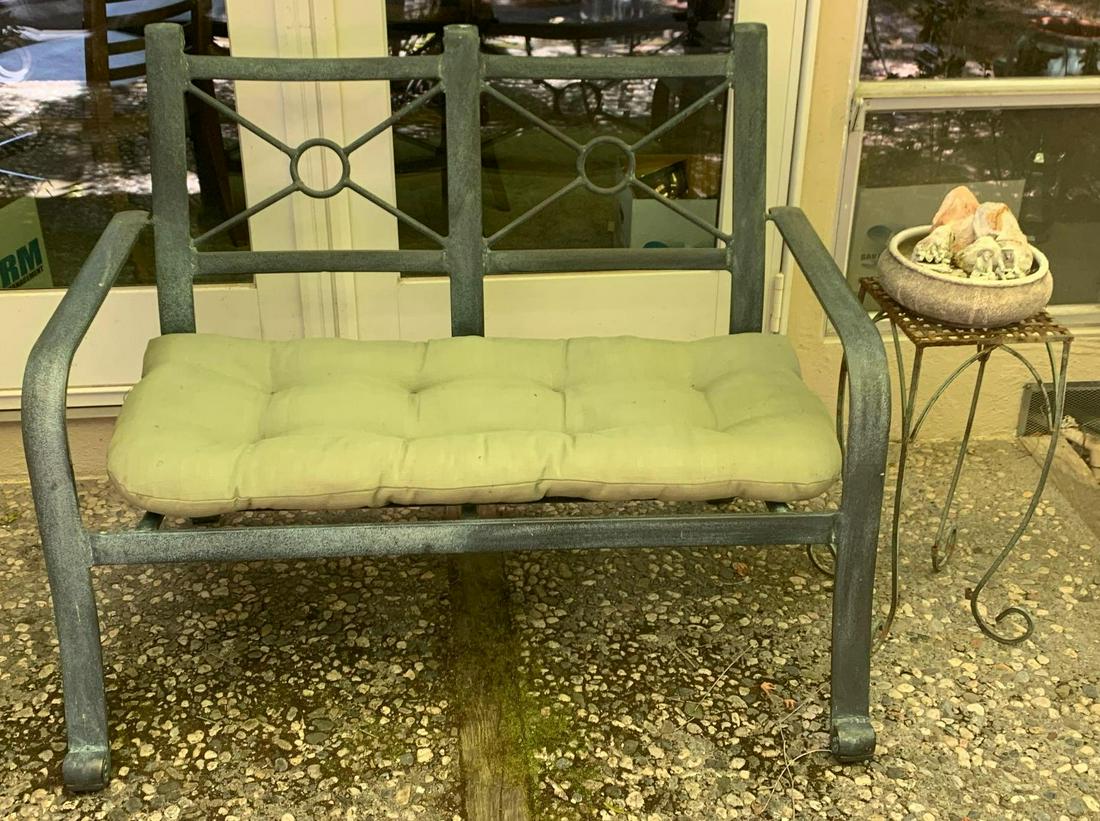 Outdoor seating for three with small table and small (1 of 4)