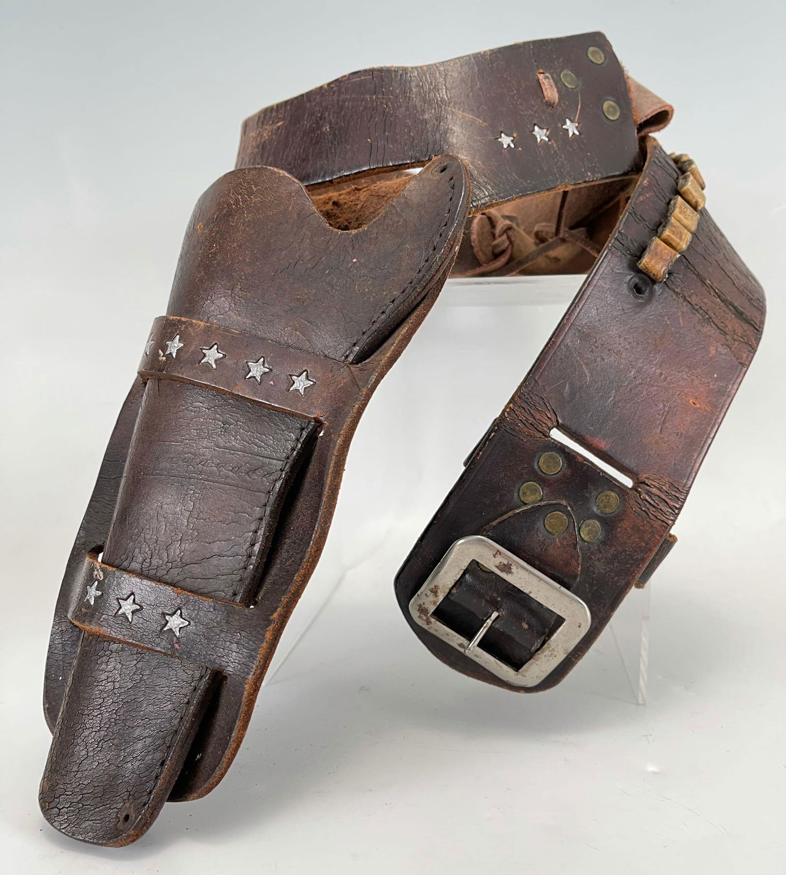 Greatest Cowboy In The World, Jack Case Show Holster: Leather Single Gun and Bullet Belt Holster. Right Handed. Embossed Jack Case Shows, Star Shapes, Boyt Des Moines, M. Belt 42.5 in x 2.6125 in, Holster 10.25 in L x 3.5 in opening. Measurements are app