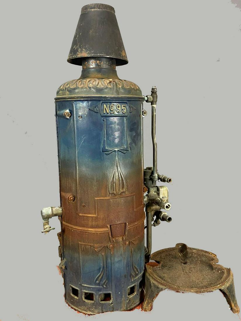 Antique Cast Iron Ruud Water Heater: Antique Cast Iron Ruud Water Heater Patent No.95 1908 Capacity 2.5 gallons. Ruud manufacturing co. Pittsburgh. With original drip pan base. Approximately 44.5 x 21 x 14 in Base 15 x 5 in