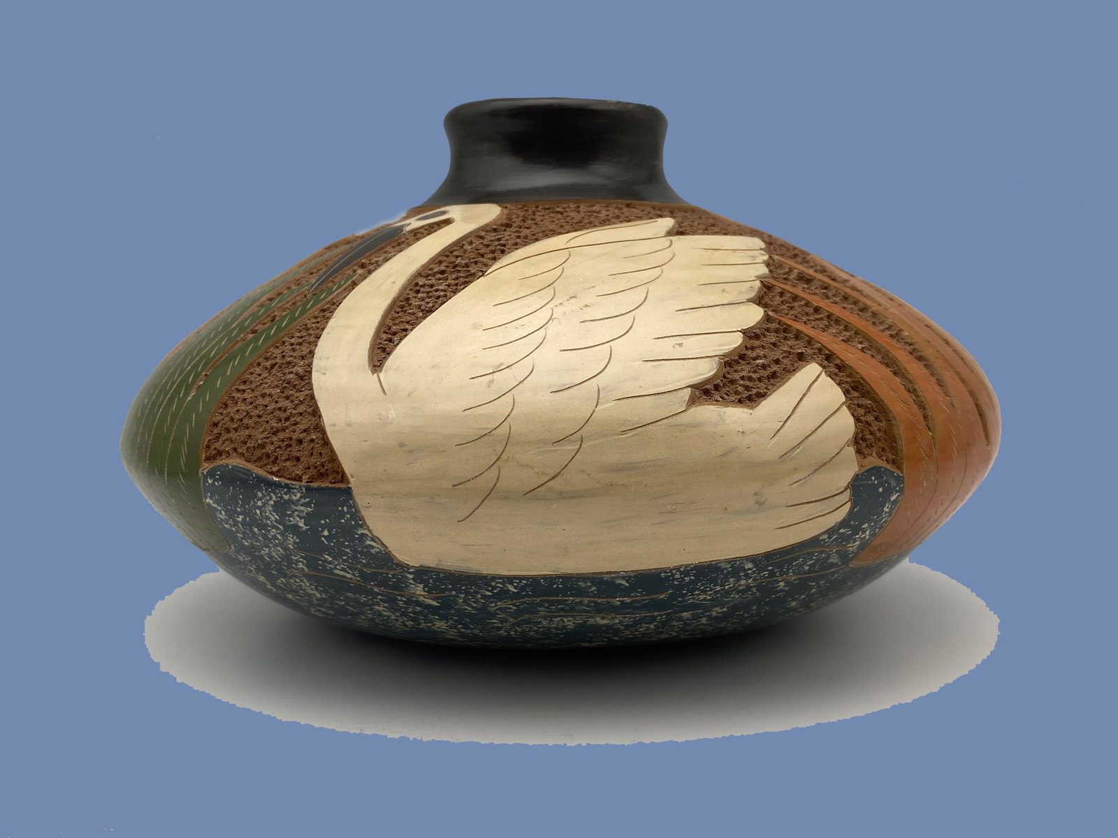 Beautifully Carved Unsigned Pot with Swan Design: Beautifully Carved Unsigned Pot with Swan Design. Approximately 7 x 7 x 4.25 in.