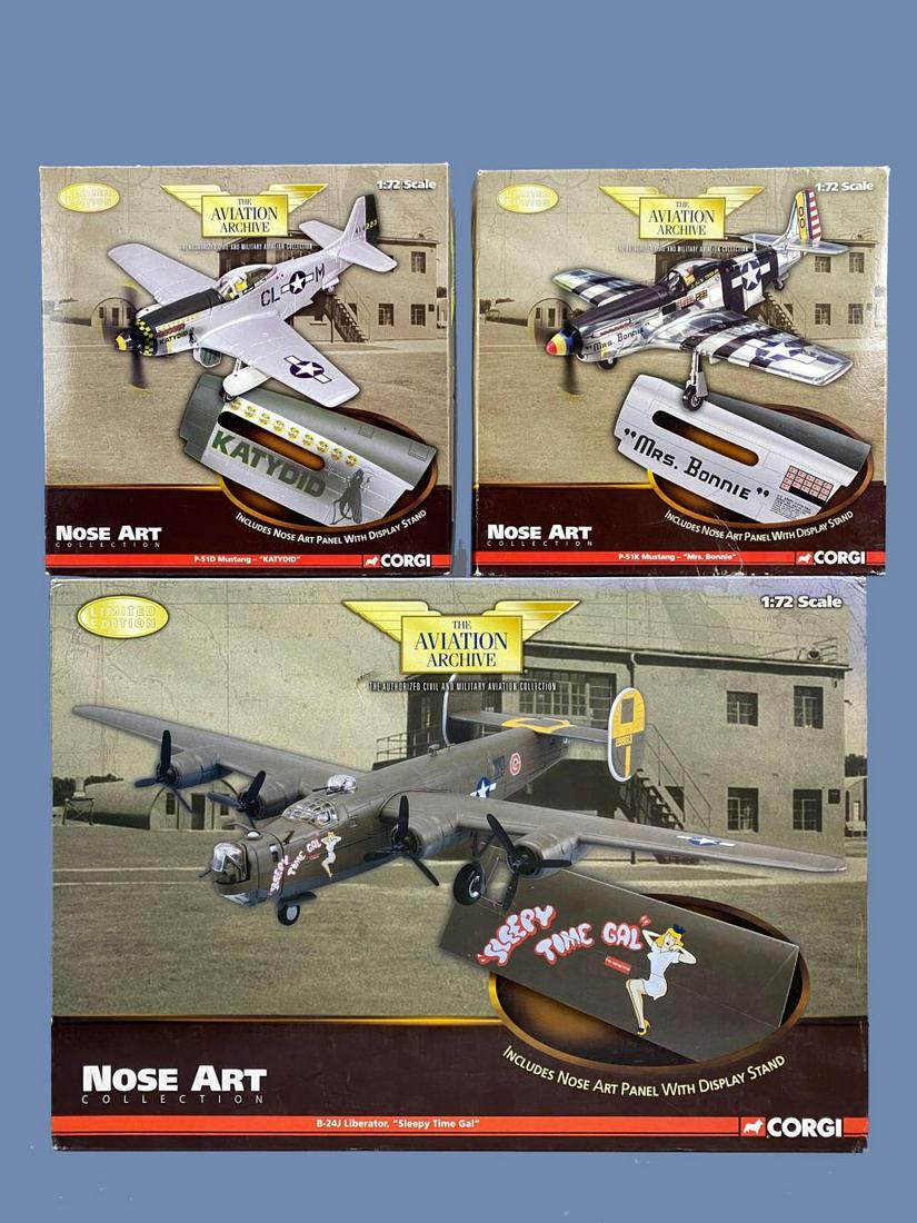 3 Corgi The Aviation Archives Nose Art Diecast Model: US32218 P-51D Mustang "Katydid", US32213 P-51K Mustang "Mrs Bonnie", and US34014 B-24J Liberator "Sleepy Time Girl". New in Boxes.