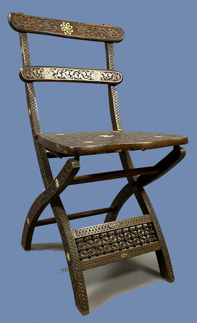 Older Middle Eastern Moorish Style Bone Inlaid Chair: Older Middle Eastern Moorish Style Bone Inlaid Chair. Approximately 32.25 x 17.5 x 19.5 in.