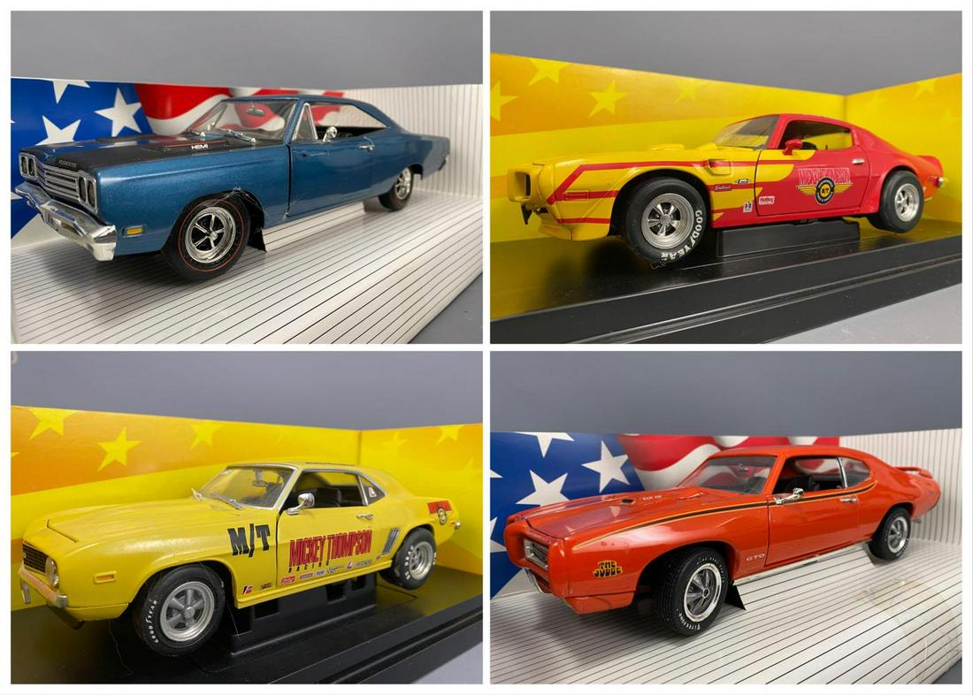 4 Ertl Collectables Diecast Model Cars: 4 Ertl Collectables Diecast Model Cars 1:18 Scale. 1969 Pontiac GTO Judge, 1970 Pontiac Trans AM, 1969 Chevy Camaro, 1969 Plymouth Road Runner. In Original Boxes.