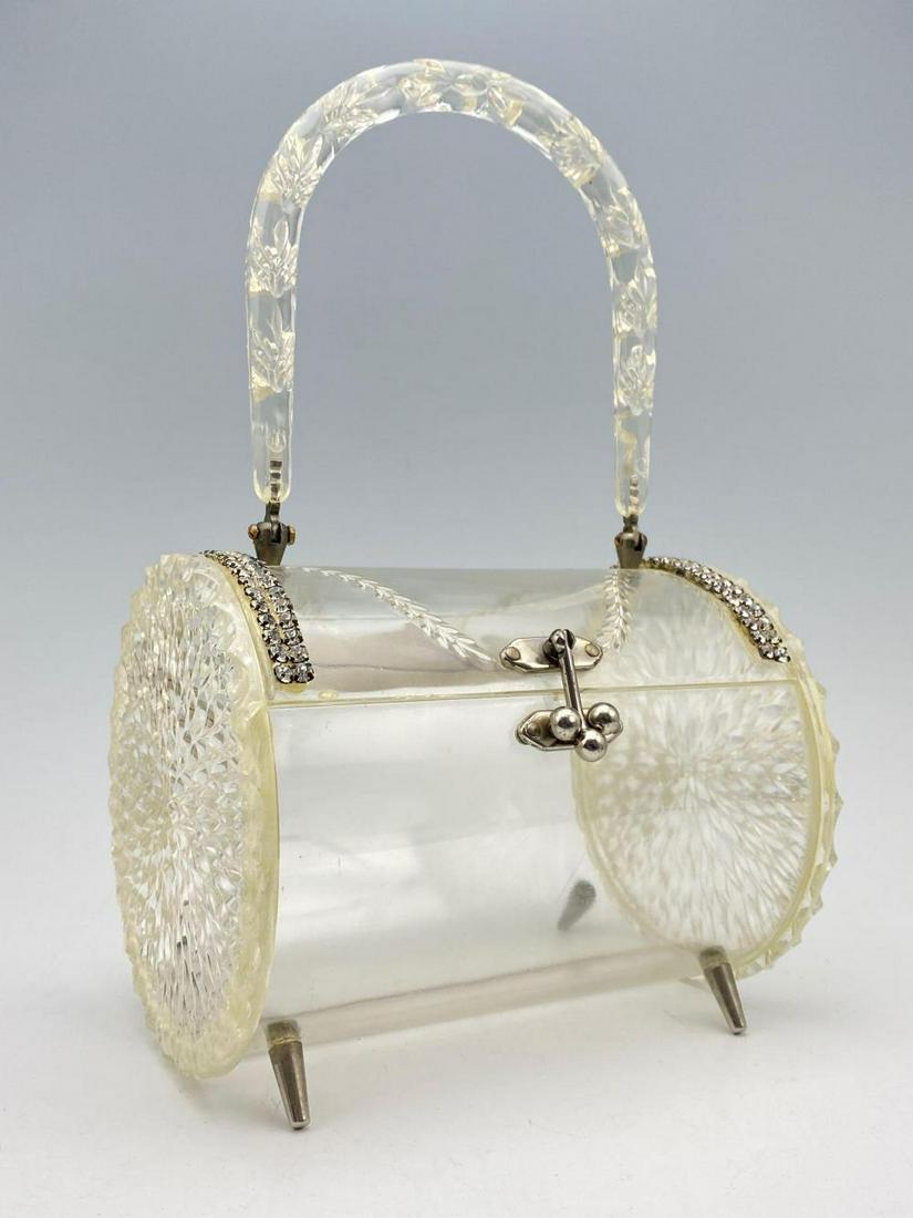 Clear Lucite Tooted Purse. With Sunflower Design: Clear Lucite Tooted Purse. With Sunflower Design. Approximately 10 x 6.5 x 5 in.SHIPPING AVAILABLE