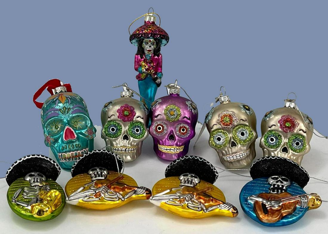 Lot of Day of the Dead Glass Christmas Tree Style: 10 Day Of The Dead Glass Ornaments. Small Skulls And Musicians Marked Midwest CBK. Tallest Ornament Approximately 5.375 x 1.75 x 1.5 in.Smallest Ornament Approximately 3.75 x 2 x 1.5 in.