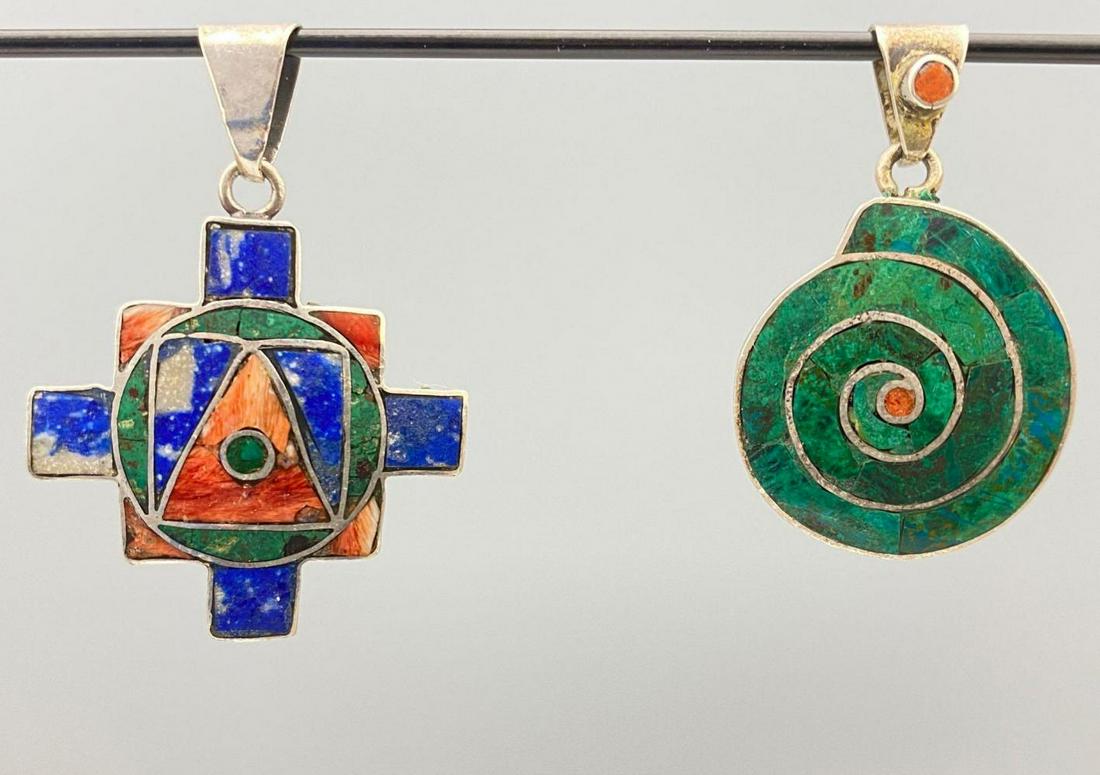 2 Sterling Silver Lapis, Spiny Oyster And Malachite: 2 Sterling Silver Lapis, Spiny Oyster And Malachite Pendants. 8.1g. Marked 925. Spiral Pendant 1.375x 0.875 in. Other Pendant 1.5 x 1.125 in. All measurements are approximate. ALL CREDIT CARDS WILL BE