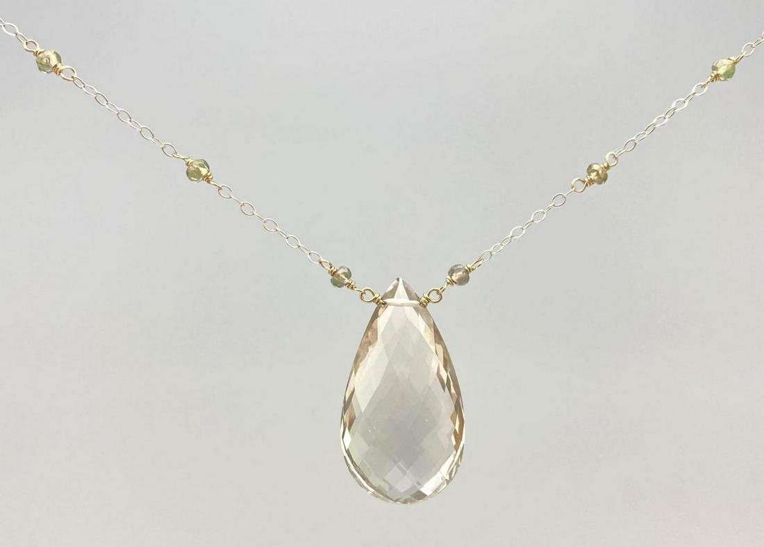 14K White Gold Multifaceted Spinel Necklace: 14K White Gold Multifaceted Spinel Necklace. 7g. Marked 14K. Approximately 16.75 in. long.ALL CREDIT CARDS WILL BE MANUALLY VERIFIED PRIOR TO SHIPMENT