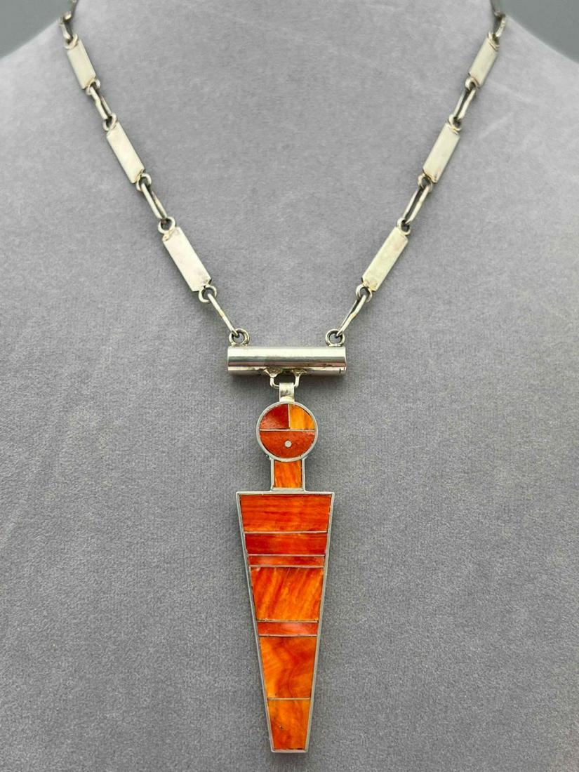 Zuni Sterling Silver And Spiny Oyster Necklace: Zuni Sterling Silver And Spiny Oyster Necklace By Harold Smith. 25.5g. Marked H Smith. Necklace 18.9375 in. long. Pendant 2.875L x 0.8125W in. All measurements are approximate. ALL CREDIT CARDS WILL B
