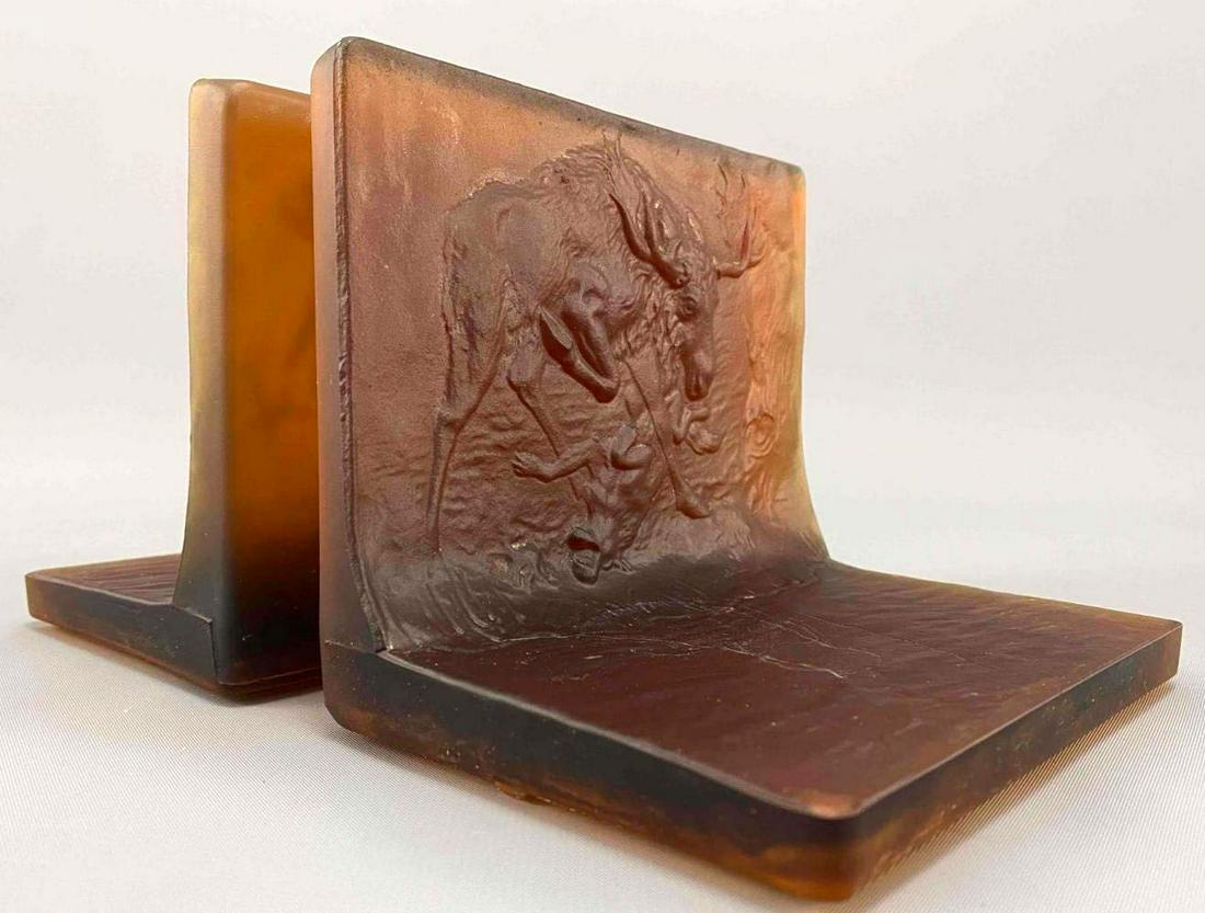 Stag and. Mountain Lion Tiffin Glass Bookends: Stag vs. Mountian Lion Tiffin Glass Bookends. Approximately 6.125W x 5.125H x 4.625L in.