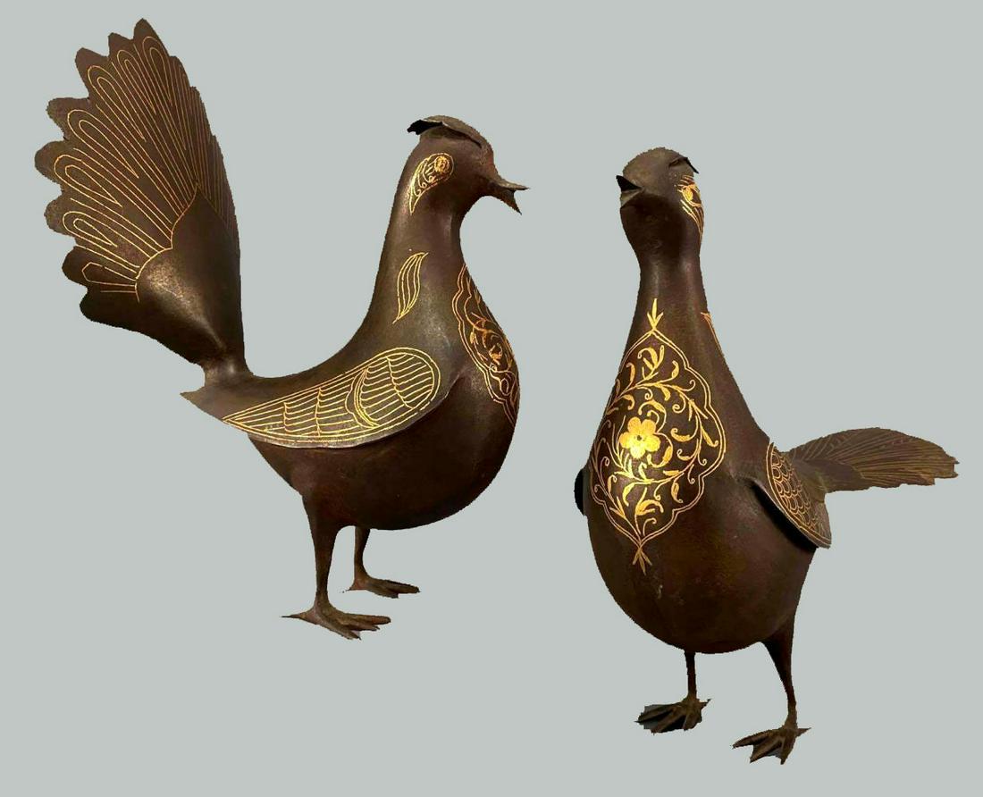 Pair of Antique Persian Damascene Birds: Pair of fine Persian damascene steel and gold birds, Qajar 19th century. Larger Approximately 12.375L x 9.8125H x 4.9375W in. Smaller Approximately 10H x 6.625L x 5.0625W in.