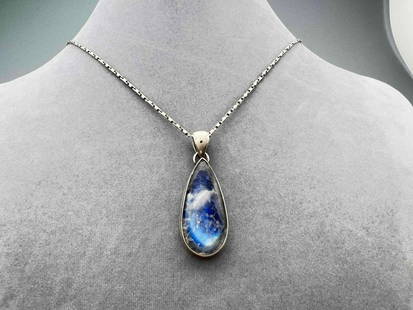 Sterling Silver Rutilated Blue Doublet Crystal Pendant, On Silver Chain: Sterling Silver Rutilated Blue Doublet Crystal Pendant, On Silver Chain. Marked 925. Chain Marked Italy 925. Pendant Approximately 2.0625L x 0.75W x 0.3125D in. Chain Approximately 18.3125L in.