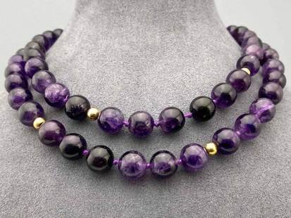 14K Amethyst Hand Knotted Bead Necklace: 14K Amethyst Hand Knotted Bead Necklace. 94.9g. Marked 14KT. Approximately 33 in. ALL CREDIT CARDS WILL BE MANUALLY VERIFIED PRIOR TO SHIPMENT.