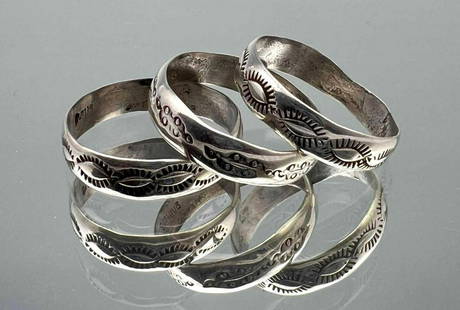 Three Navajo Sterling Silver Hand Stamped Bands: Three Navajo Sterling Silver Hand Stamped Bands. 6.0g. Size 9.